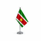 Drapeau bureau du Suriname modèle Argent avec mât et socle en acier inoxydable